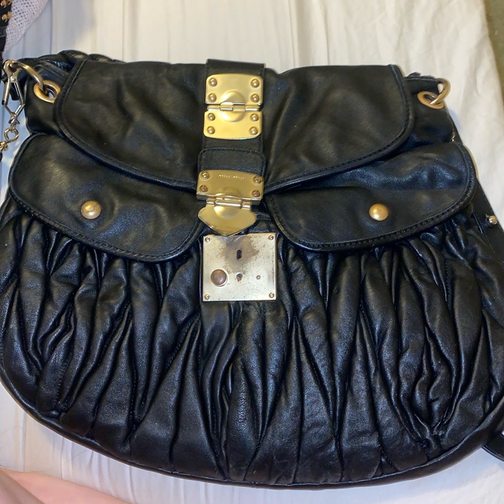 Miu Miu Black Crossbody Bag with Gold Accents